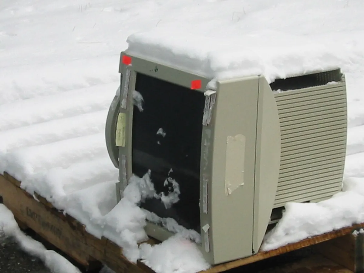 Batch Image Converter - Computer monitor on pallet in snow