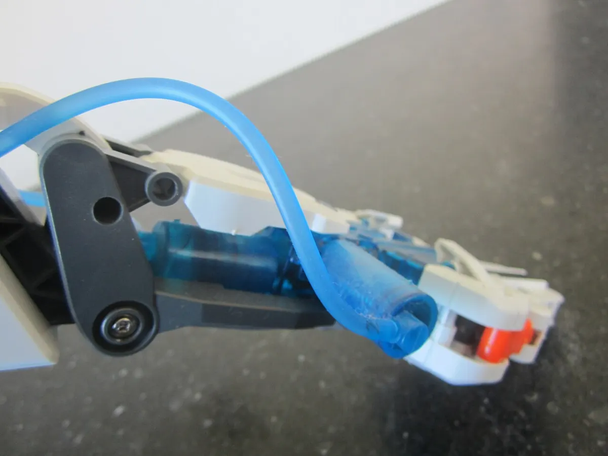 Bluetooth Controlled Robot - Detail of a hydraulic toy robot arm