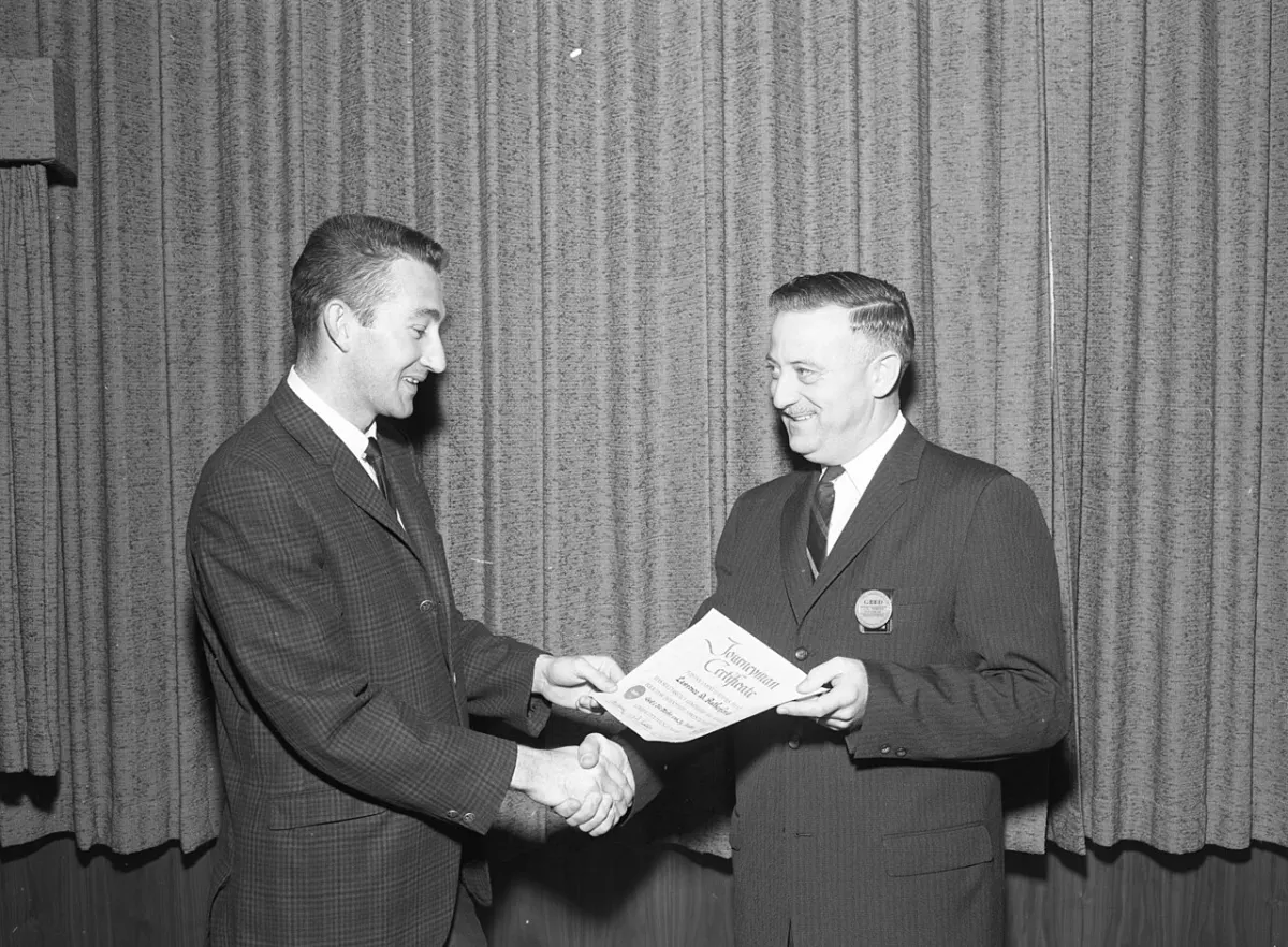 Certificate Management System - 23 Convair Negative Image - L D Rutherford receiving his apprentice graduation certificate