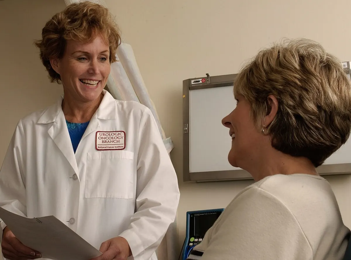 Doctor Appointment App - Doctor talking with a patient