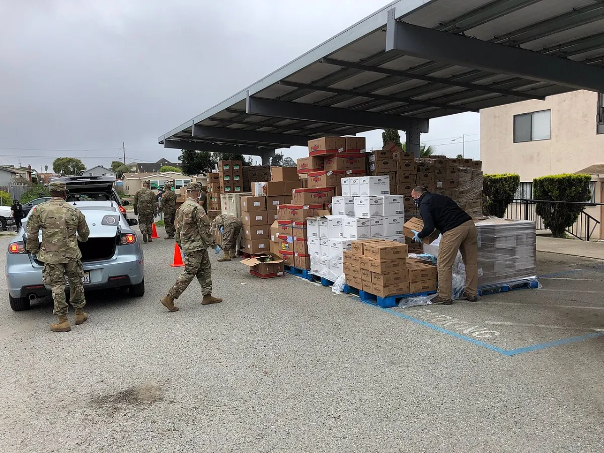 Food Bank Management System - Jimmy Panetta distributing food at Monterey County Food Bank 02