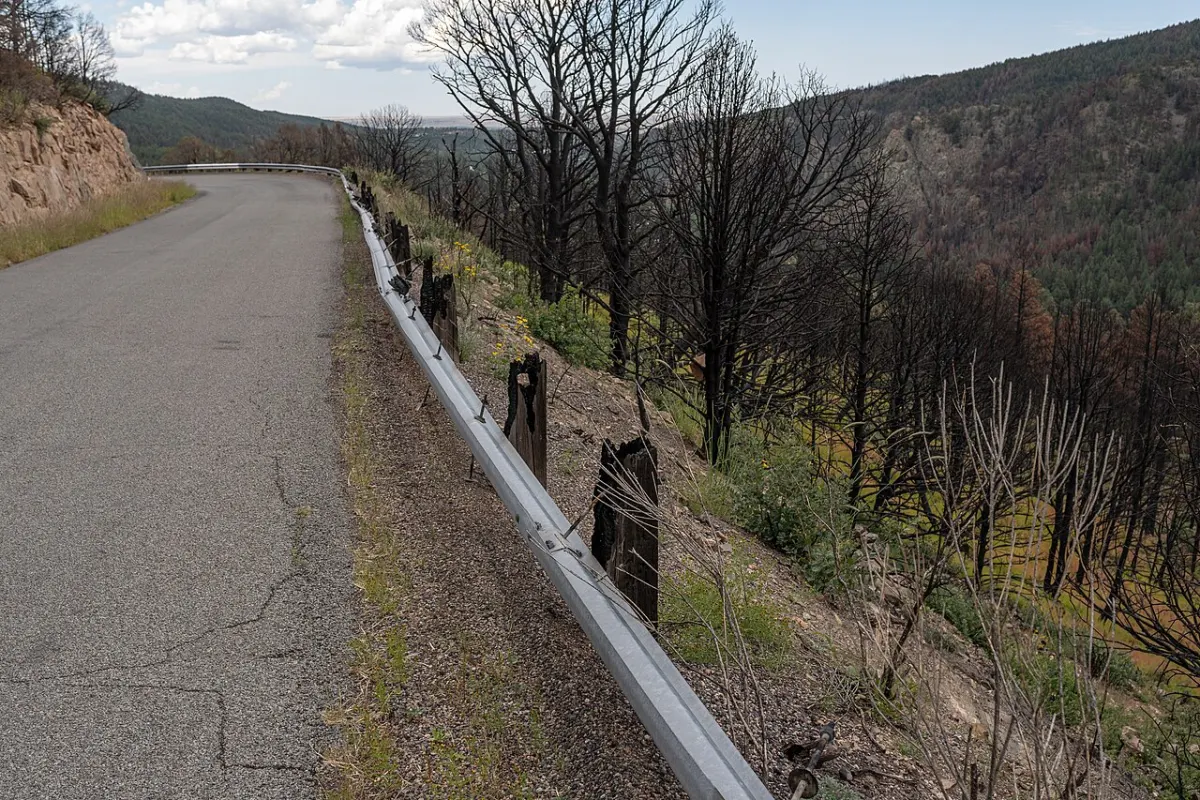 Forest Fire Prediction - Guard rail damage along Forest 263 Rd as a result of the from the Calf Canyon Hermits Peak