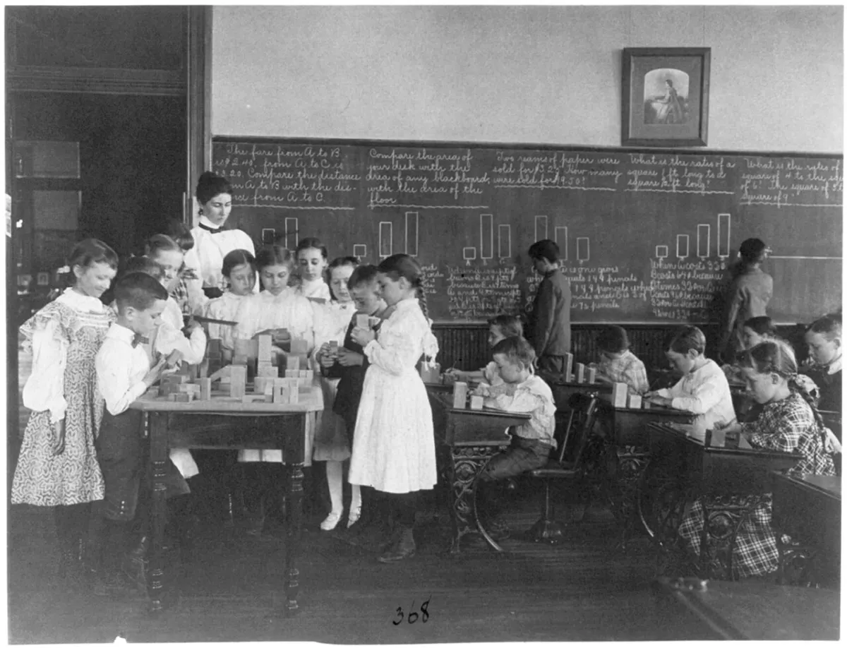 Handwritten Digit Recognition - Classroom scene in Washington, D.C. elementary school - children working with blocks and a