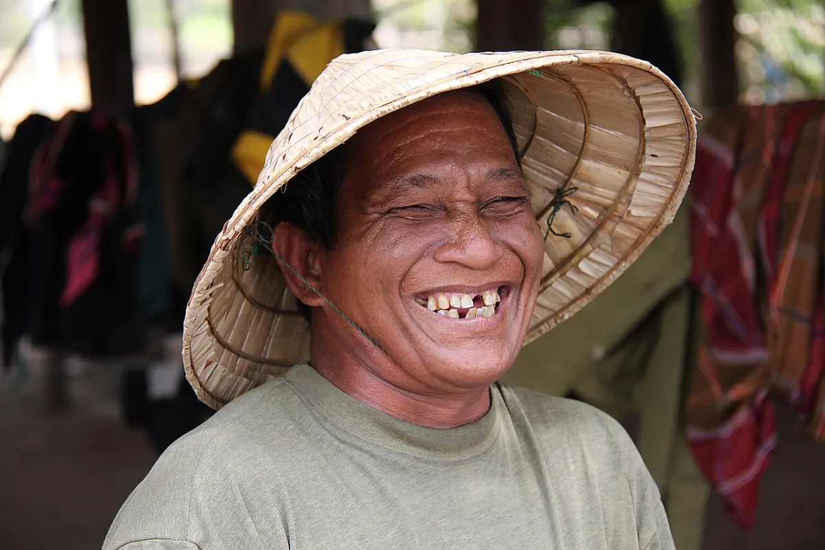 Meme Generator App - Laotian laughing man with hat