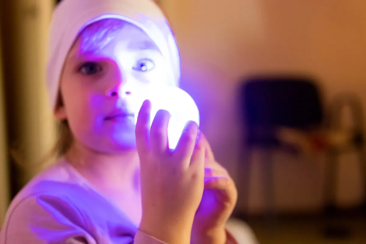 Music Recommendation System - Five year old girl in a state of agitation, listening to trance music at a trance music pa