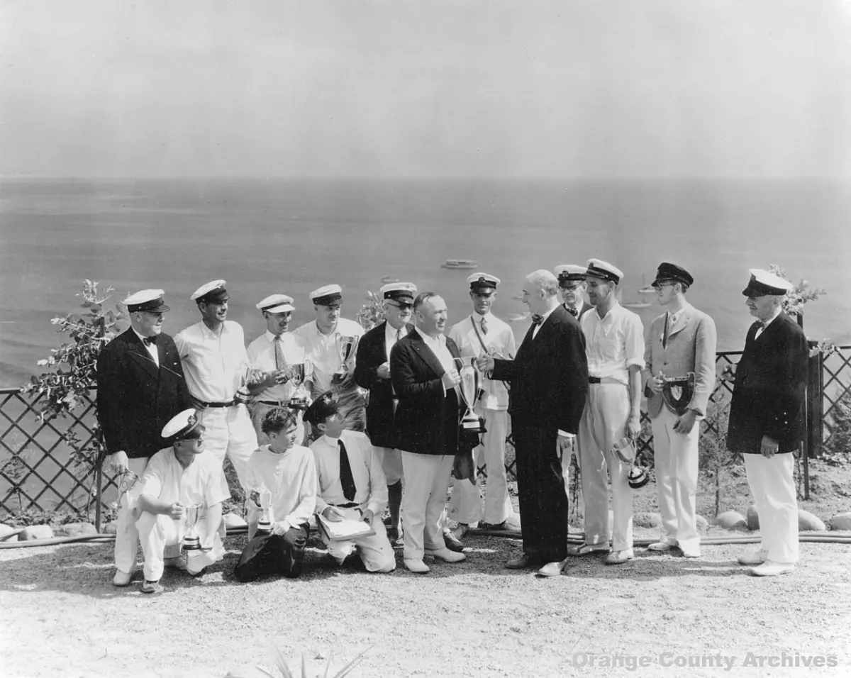 Online Documentation Portal - Developer H.Sidney Woodruff presenting cup to winner of Dana Point yacht race, 1929