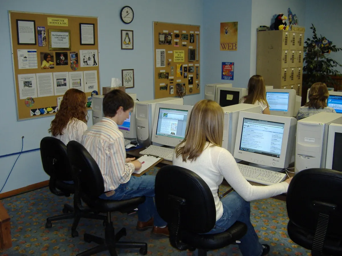 Online Examination Portal - Students working on class assignment in computer lab