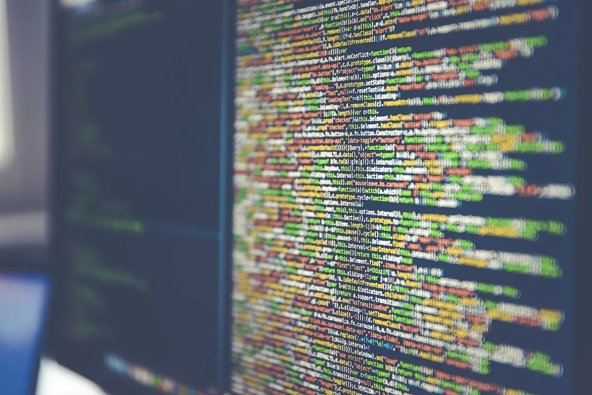 Pastebin Clone - Code on computer monitor (Unsplash)