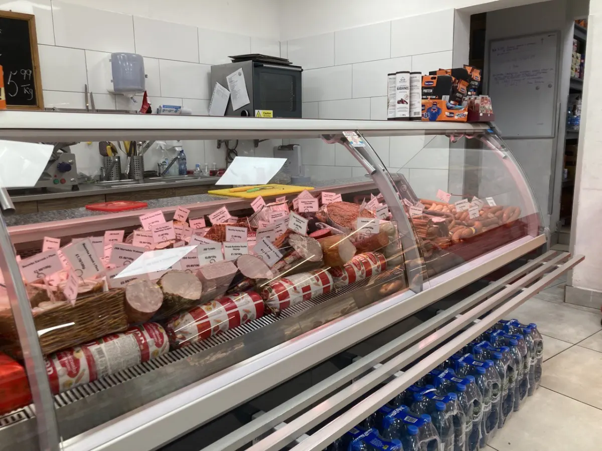 Payroll Tax Management System - The meat counter of a Polish shop in London