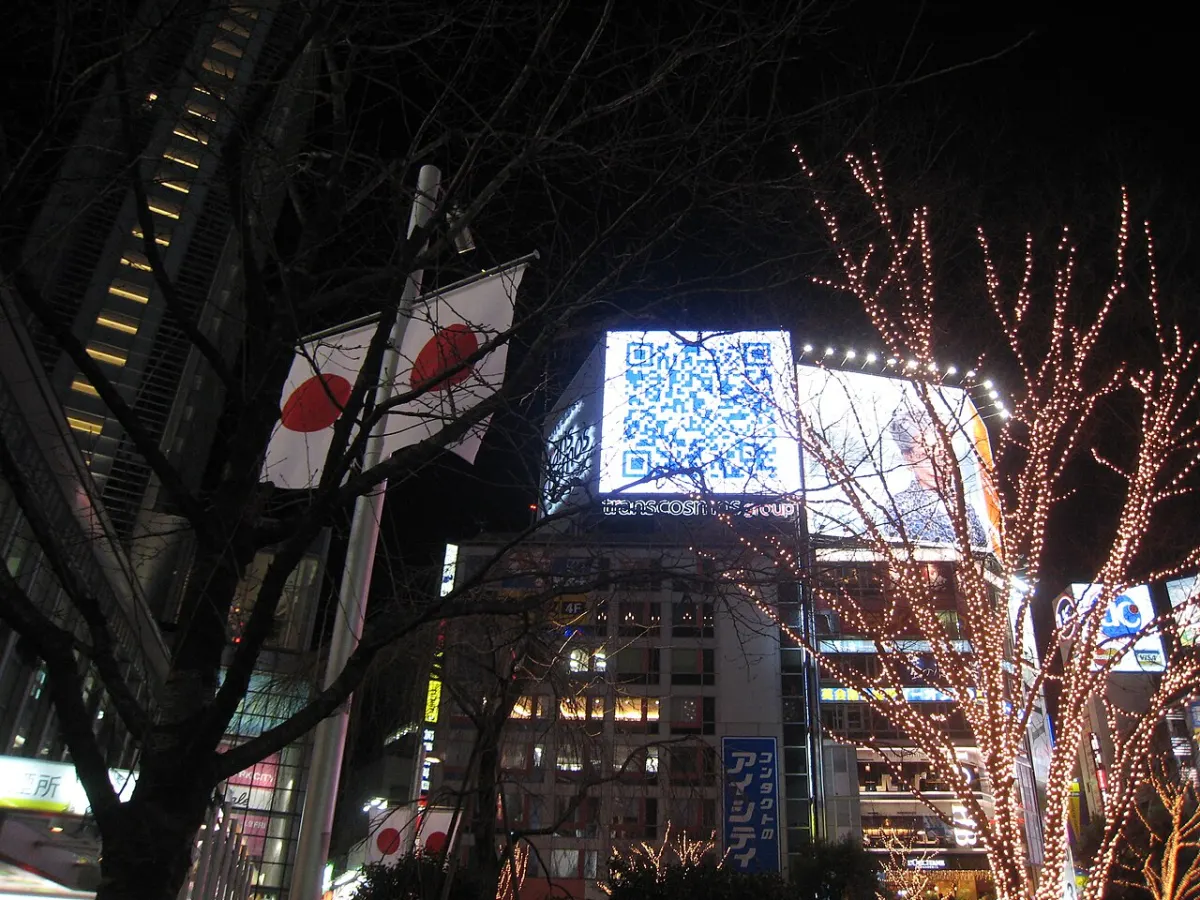 QR Code Scanner App - Huge QR code billboard in central Shibuya, readable even behind trees