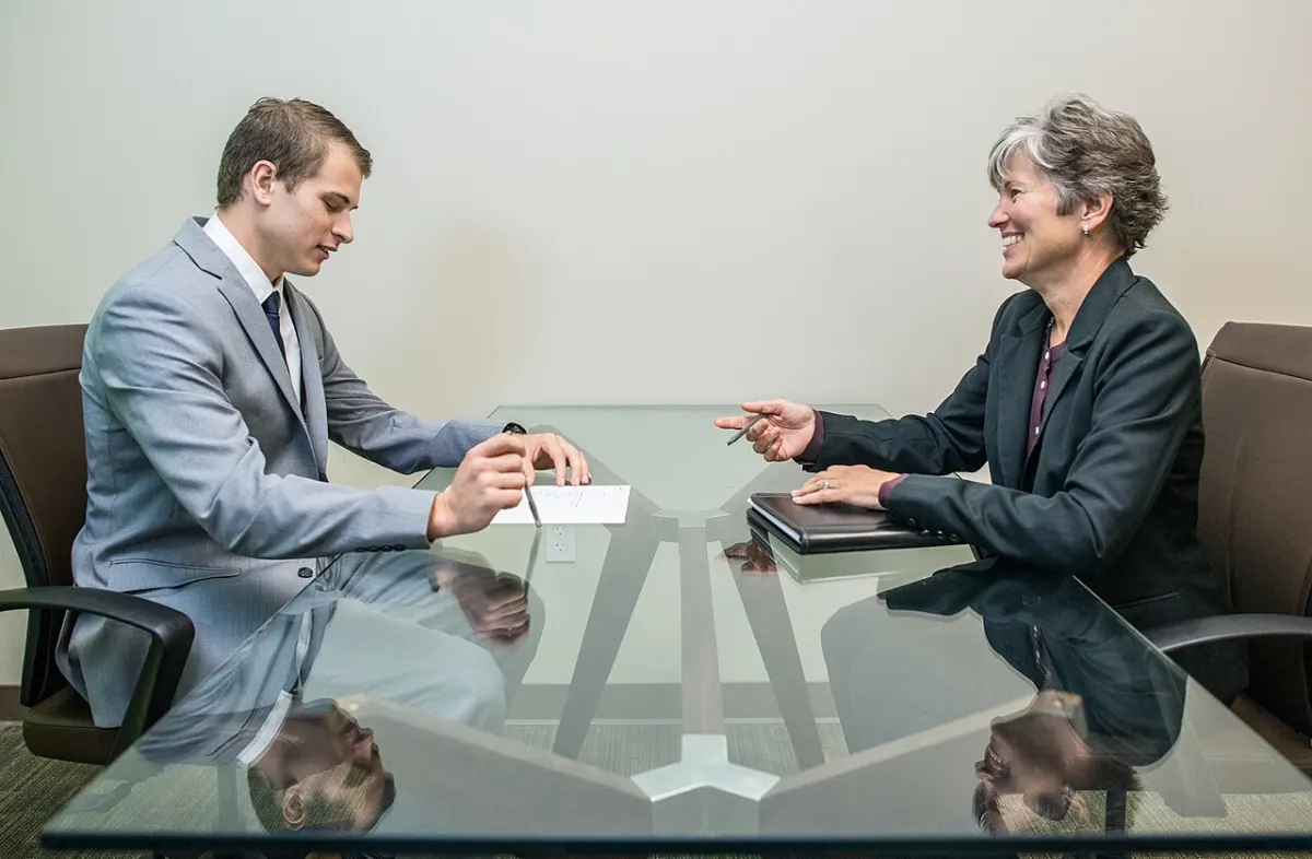 Recruitment Management System - Young Man on a Job Interview