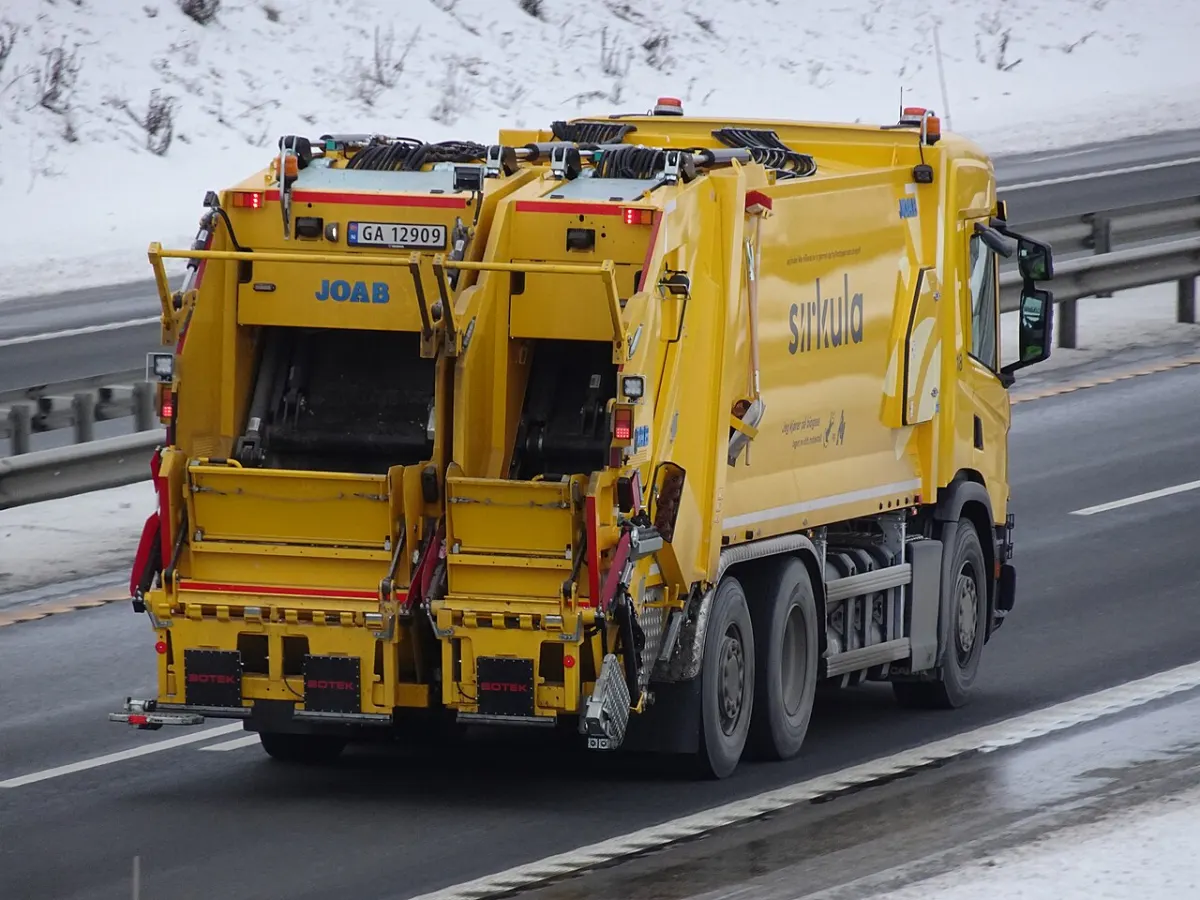 Waste Collection Management System - Garbage Truck on E6 Highway